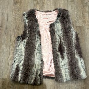 Super soft and fuzzy girls faux fur vest. Cat and Jack size 10/12.